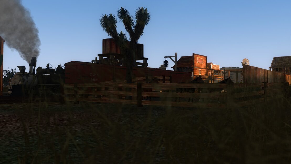 Trainz screenshot of an electric commuter train at a busy South African station